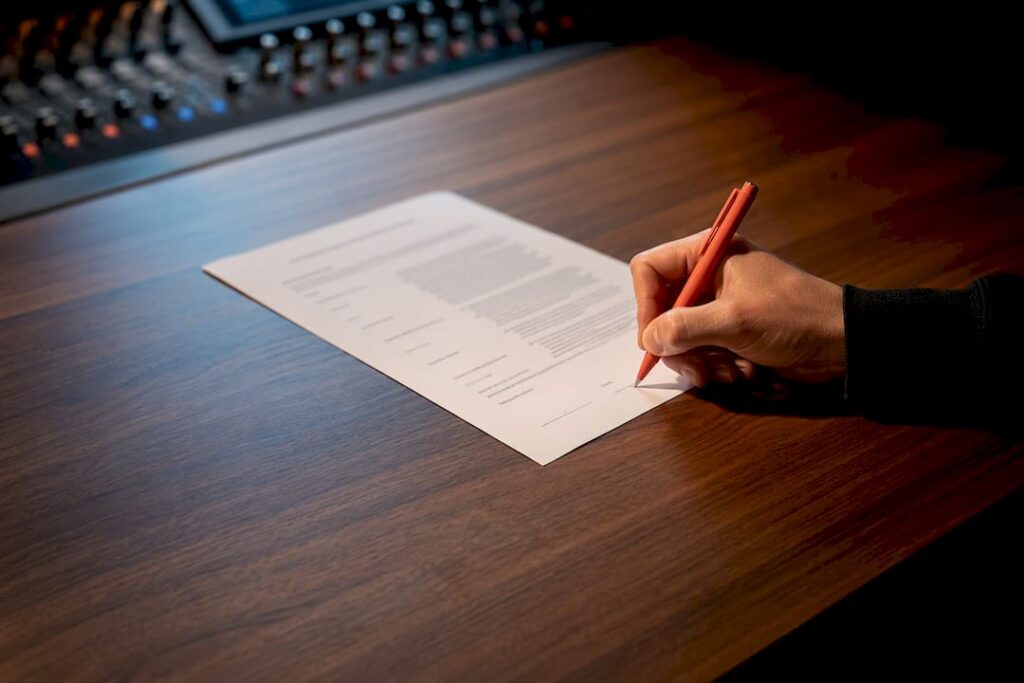 Client signing a studio approval form