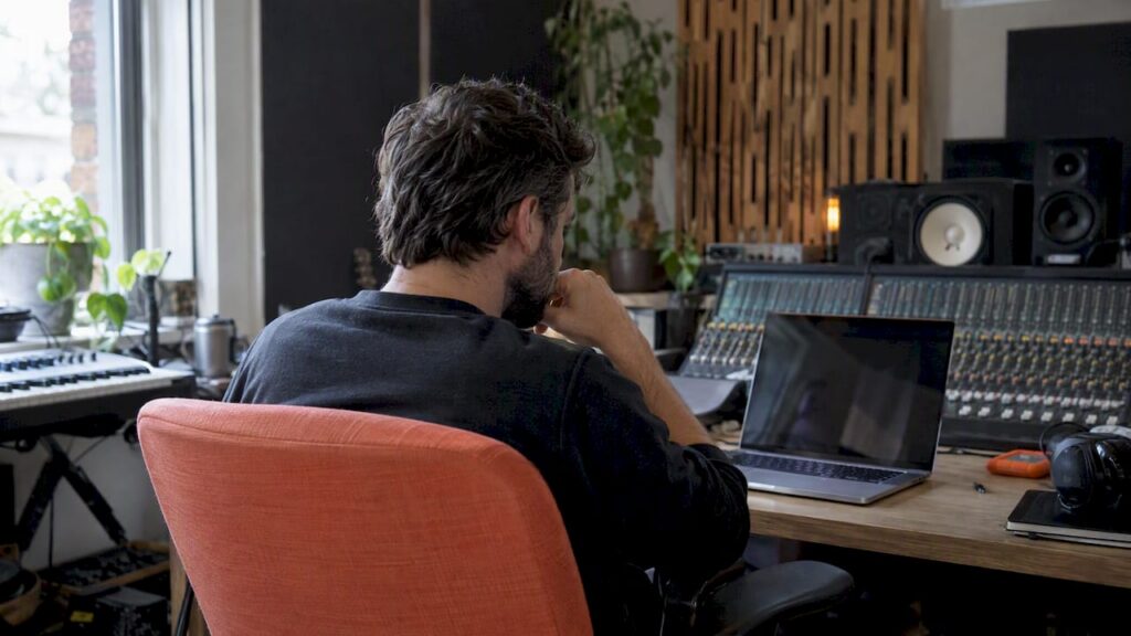 Engineer weighing email against a client portal
